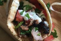 Sun-Drenched Steak Pita Wraps with Refreshing Mint Yogurt