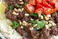 Savory Spiced Beef Hummus with Golden Pine Nuts