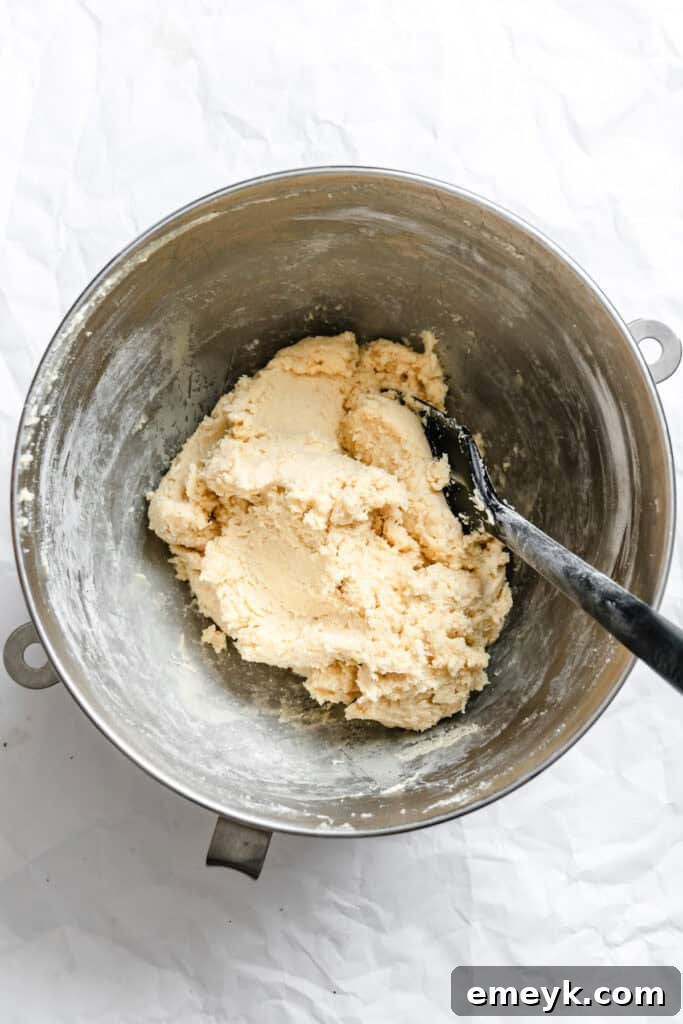 Easy Snickerdoodle Recipe showing the chilled cookie dough in a bowl, ready to be scooped.