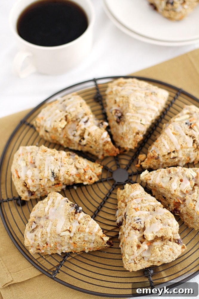 Daybreak Bliss Scones 2 Freshly baked Morning Glory Scones cooling on a wire rack, golden brown and inviting.
