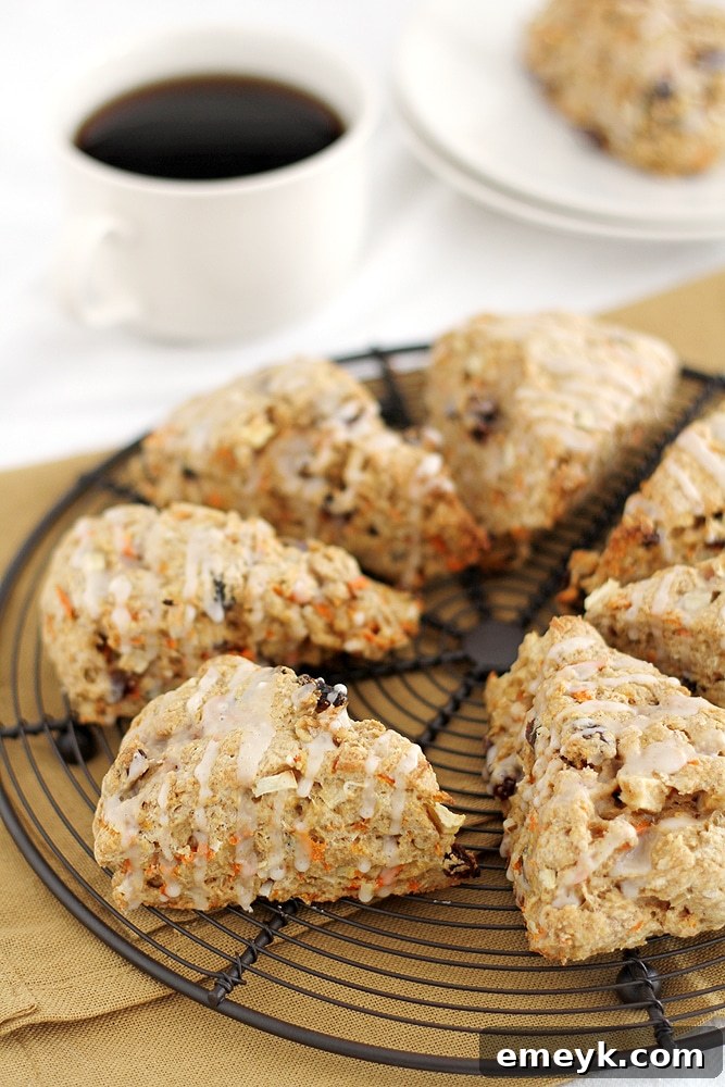 Daybreak Bliss Scones 3 A stack of Morning Glory Scones next to a steaming coffee mug, ready for breakfast.