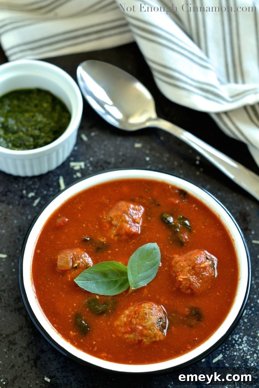 Ingredients for Spinach and Tomato Soup laid out, including a jar of basil pesto.