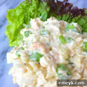 Lightened Chicken Salad served with lettuce cups and whole grain bread