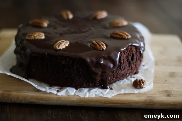 Gluten-free chocolate cake with coconut-chocolate ganache, a clean eating and almost Paleo dessert recipe.