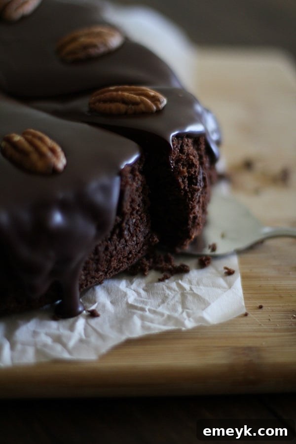 Gluten-free chocolate cake with coconut-chocolate ganache, a clean eating and almost Paleo dessert recipe.