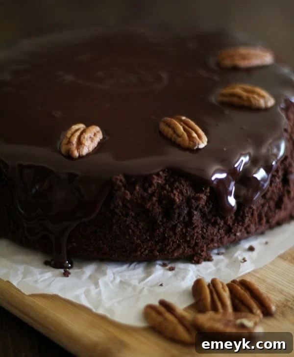 Gluten-free chocolate cake with coconut-chocolate ganache, a clean eating and almost Paleo dessert recipe.