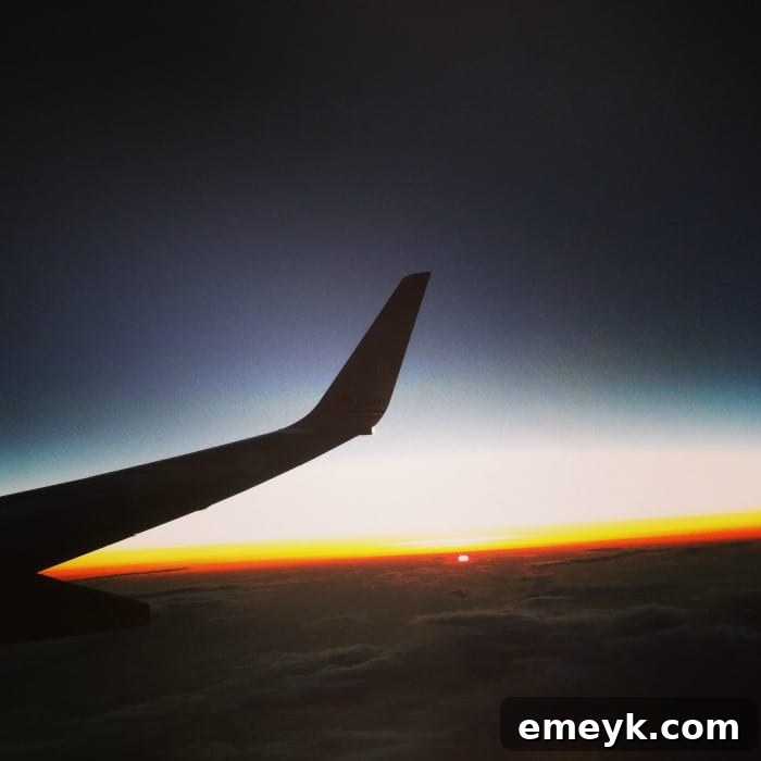 Stunning sunset view from an airplane window over Miami