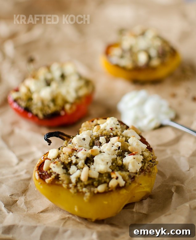 Colorful and hearty Mediterranean Lamb and Couscous Stuffed Peppers, baked to perfection, making a wholesome and visually appealing main course.