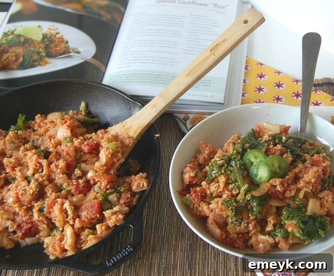 A serving of Spanish Cauliflower Rice, garnished with fresh herbs.