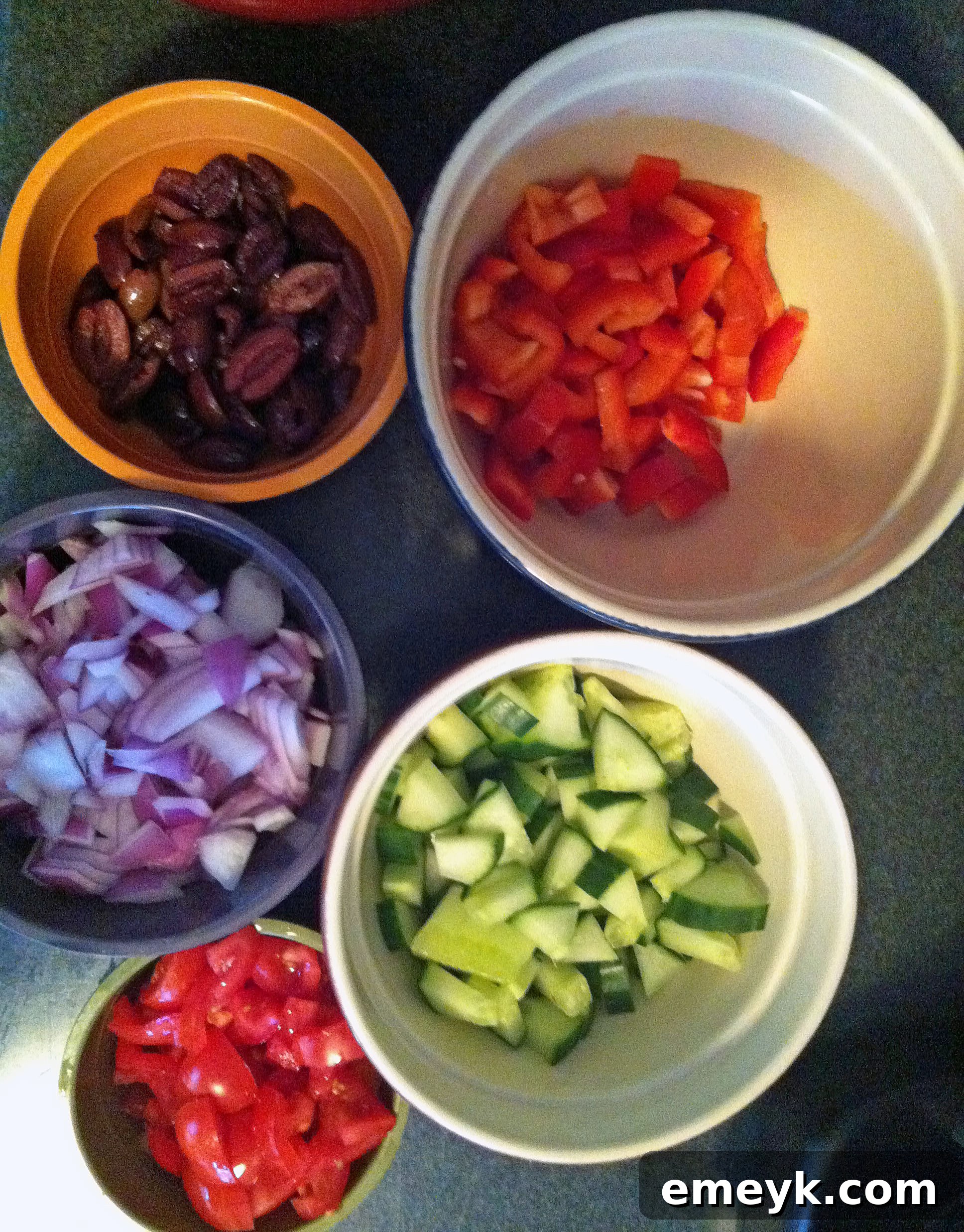 Vibrant Veggies and Olives for Pasta Salad Assortment of fresh ingredients for Greek Pasta Salad, including vibrant vegetables and olives