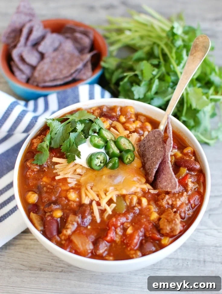 Hearty Slow Cooked Turkey Chili 5 Slow Cooker Turkey Chili garnished with fresh cilantro in a bowl