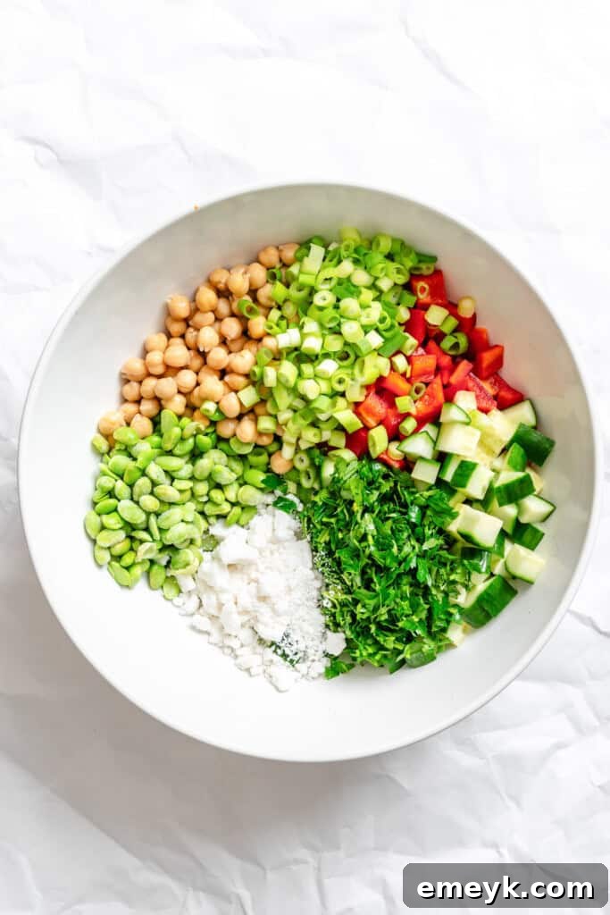 Edamame Chickpea Feta Salad ingredients in bowl