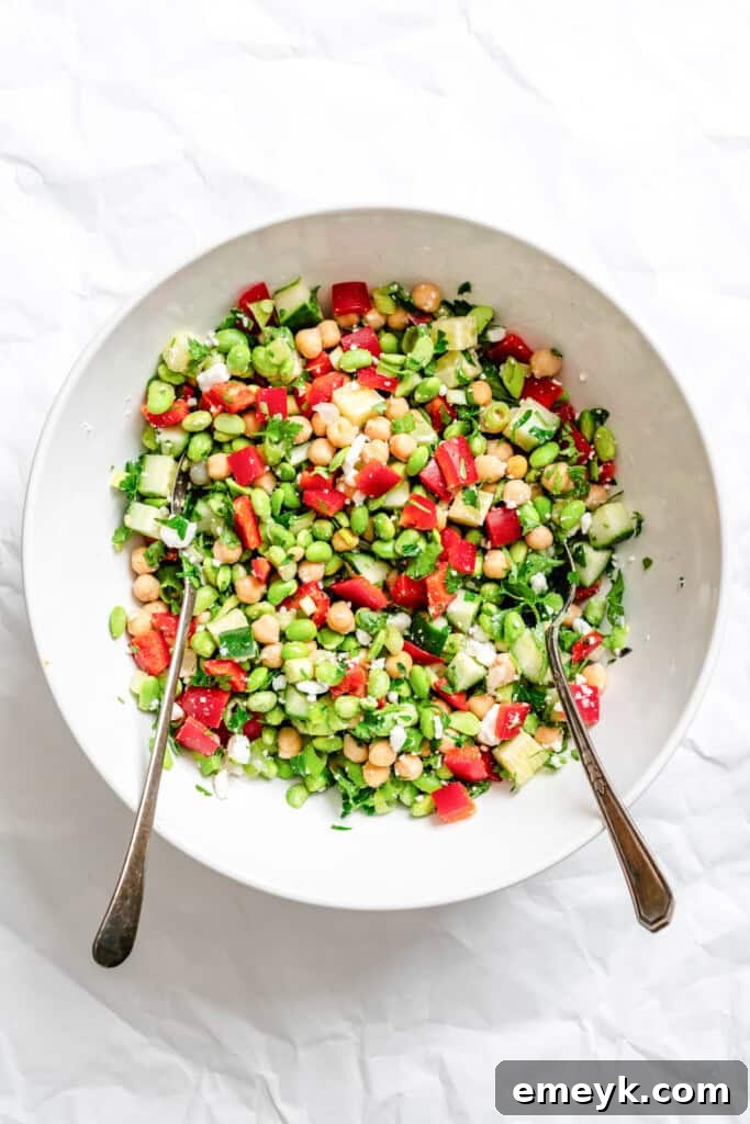 Edamame Chickpea Feta Salad mixed in a bowl