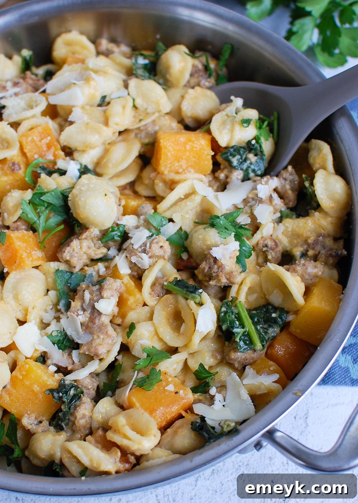 Golden Butternut Squash Pasta with Savory Sausage 5 Butternut Squash Pasta cooking in a large skillet