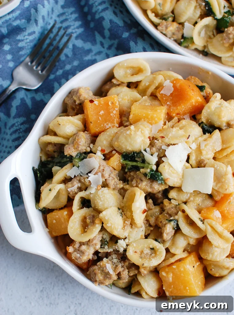 Golden Butternut Squash Pasta with Savory Sausage 6 Butternut Squash Pasta topped with freshly grated Parmesan cheese