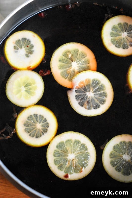 Holiday Mulled Cranberry Tea with lemon slices