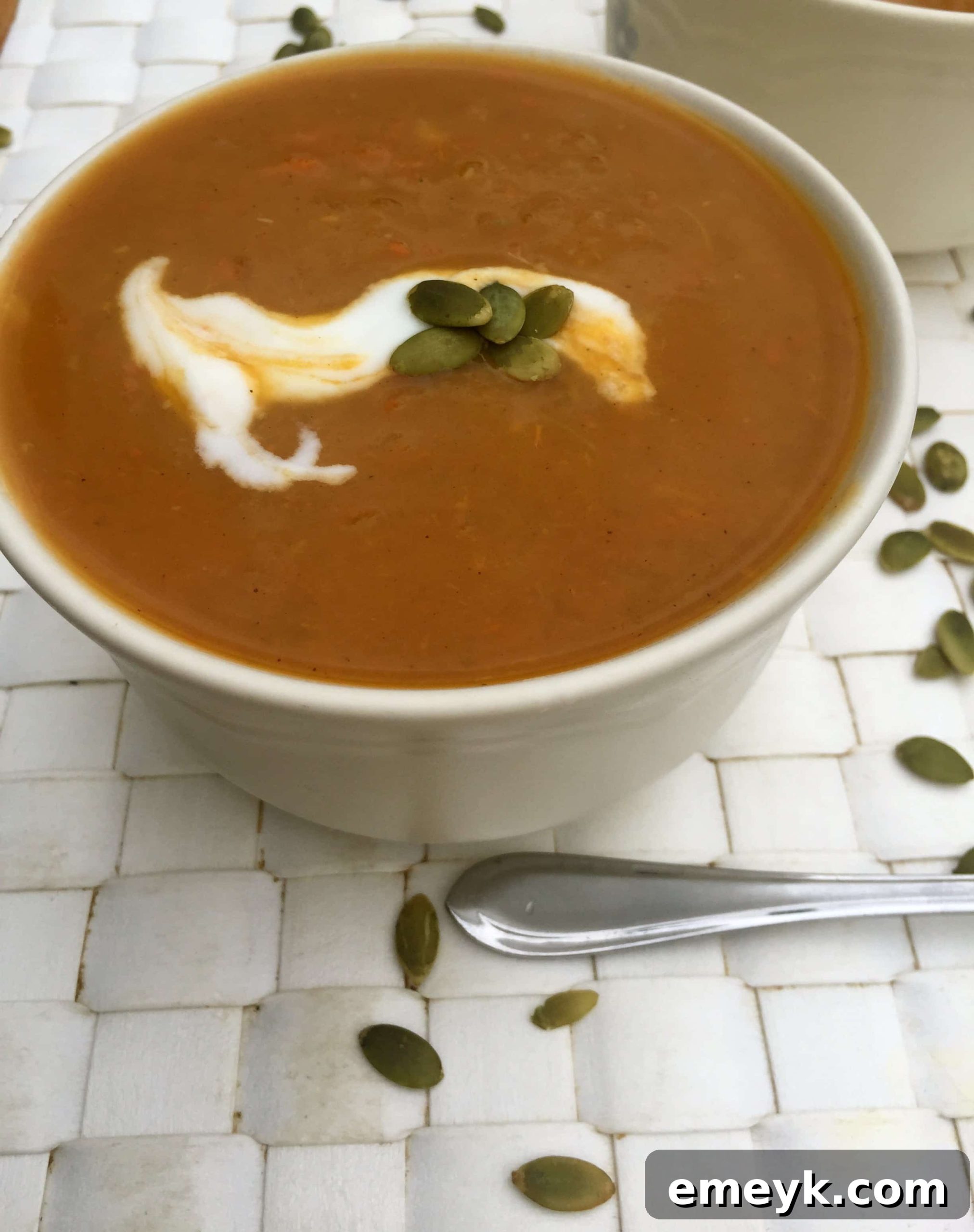 Delicious and comforting Slow Cooker Butternut Squash Sweet Potato Soup, ready to be served.