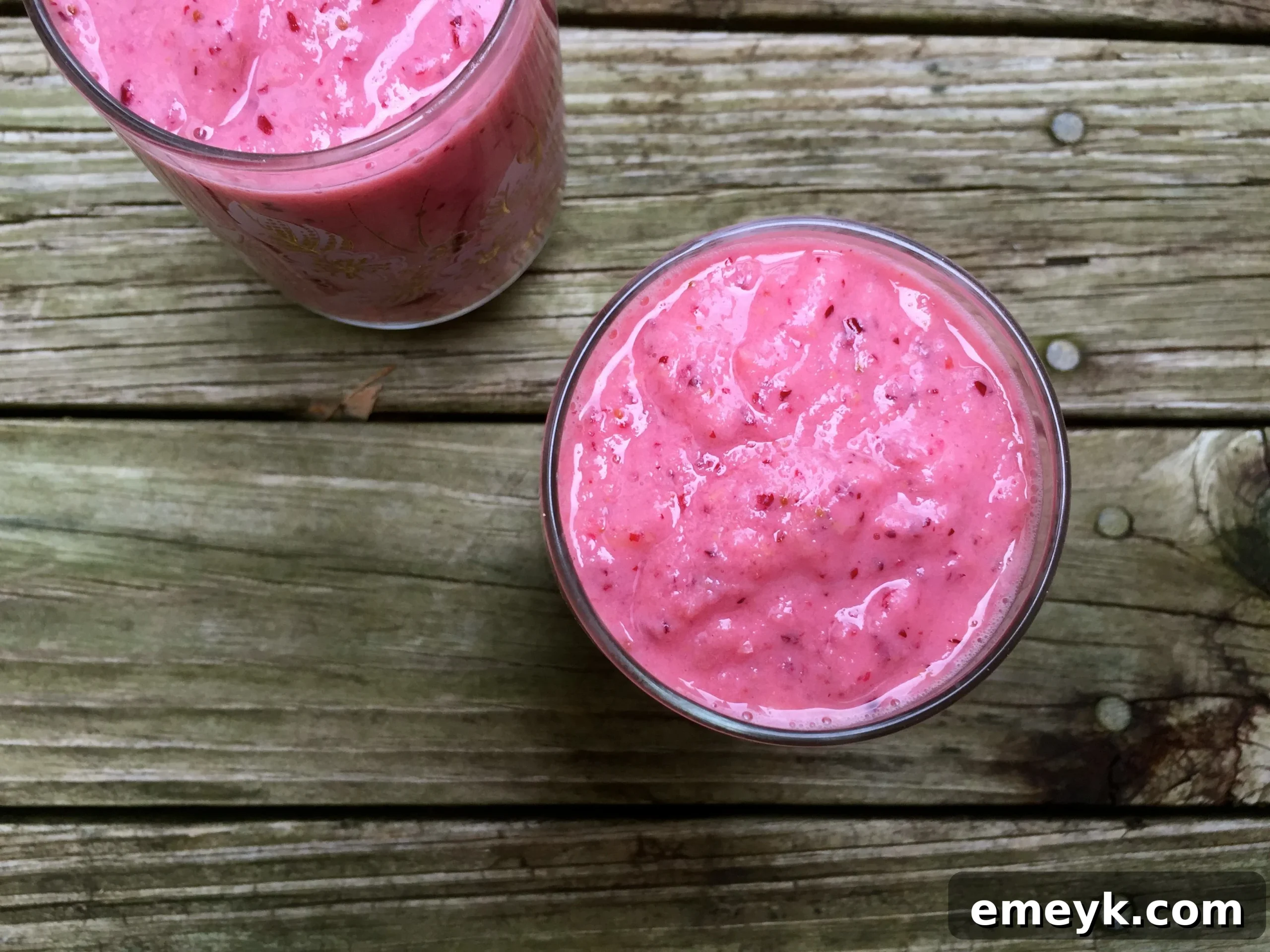 Refreshing Cranberry Pear Orange Smoothie in two glasses