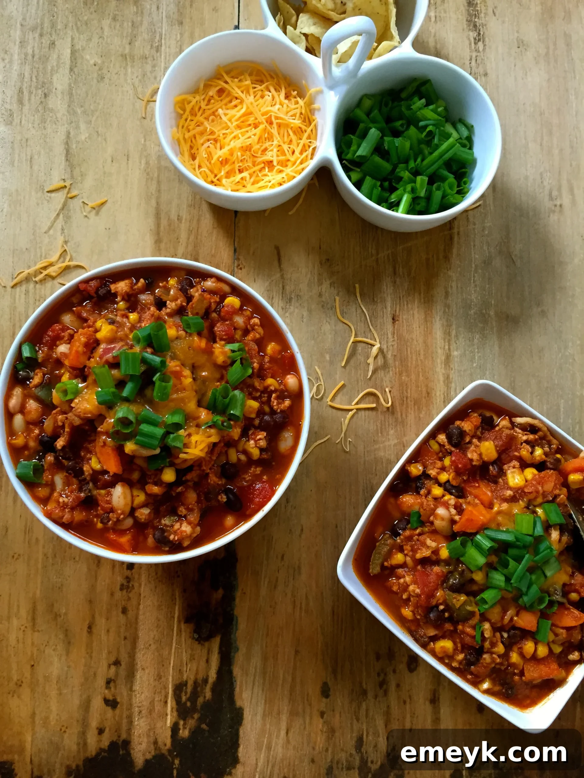 White and Black Bean Turkey Chili simmering in a pot