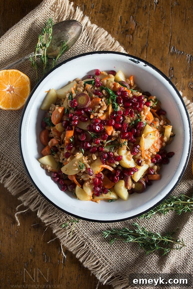 Embrace the Colors of Wellness 12 Farro Carrot Pomegranate Salad, featuring the earthy tones of farro, bright orange carrots, and red pomegranate seeds