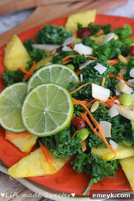 Embrace the Colors of Wellness 18 Tropical Kale Salad with Pineapple Honey Lime Dressing, a refreshing green salad with pineapple chunks