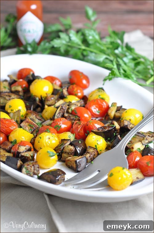 Embrace the Colors of Wellness 33 Spicy Roasted Eggplant and Cherry Tomatoes, a simple yet flavorful side dish