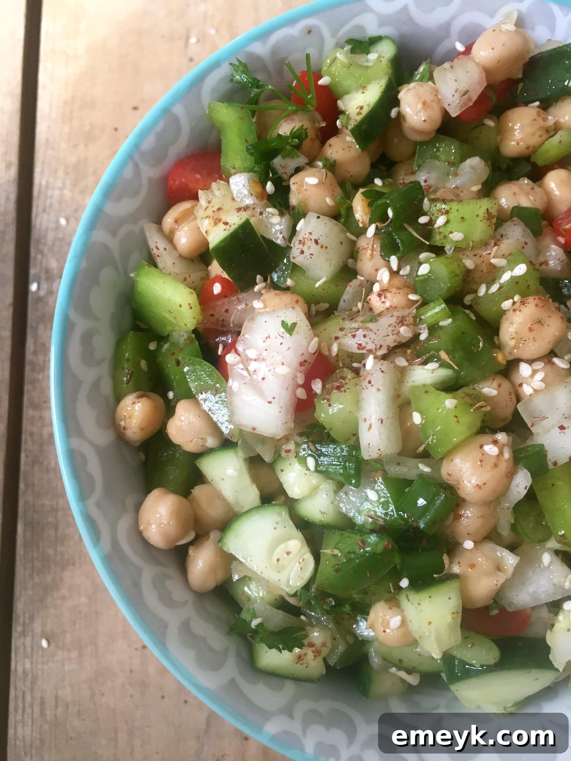Vibrant Chopped Chickpea Salad 4 A bowl of Chopped Chickpea Salad with a spoon