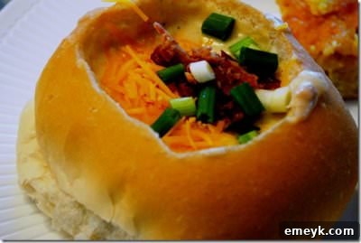 Rich and creamy Baked Potato Soup topped with crispy bacon, green onions, and shredded cheese.