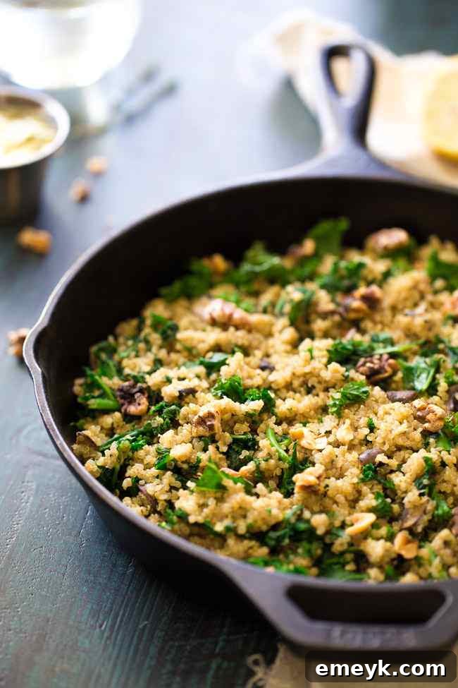 A wholesome Kale and Quinoa Skillet with Garlic Mushrooms and Herbs, prepared in a single pan for an easy and flavorful dinner.