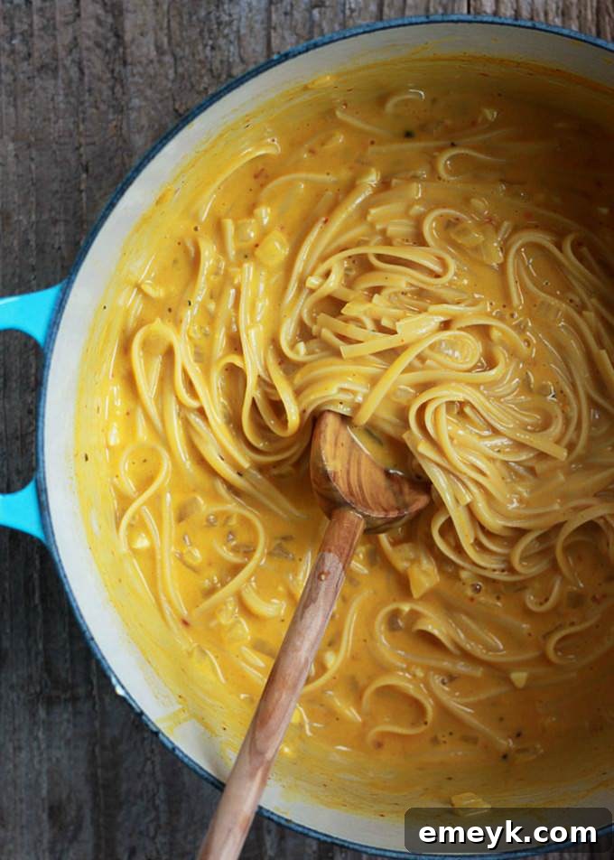 One-Pot Creamy Pumpkin Pasta, a rich and simple vegetarian pasta dish prepared in 20 minutes.