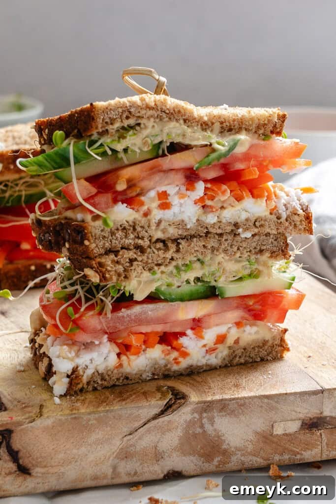 Mediterranean Vegetable Sandwich stacked high with fresh ingredients.