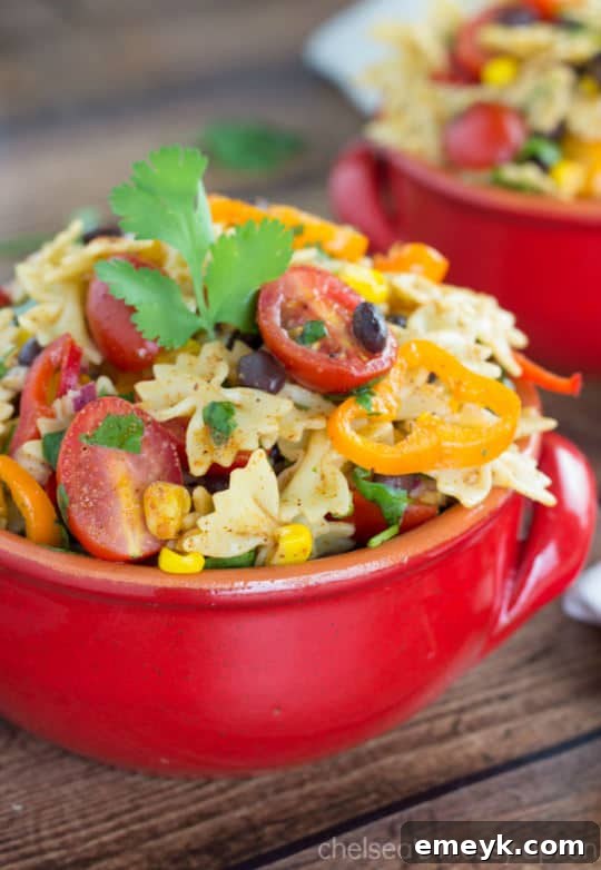 Bold and zesty Southwest Pasta Salad with black beans, corn, and a flavorful dressing.