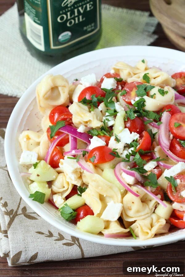 Colorful Garden Tortellini Pasta Salad featuring fresh vegetables and cheese tortellini.