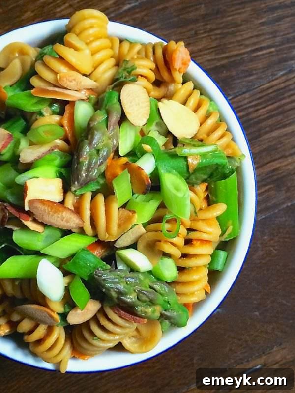 Unique Asparagus Pasta Salad with a rich and creamy peanut dressing.