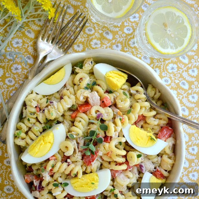 Simple yet satisfying Humble Pasta Salad with flaked tuna and fresh vegetables.