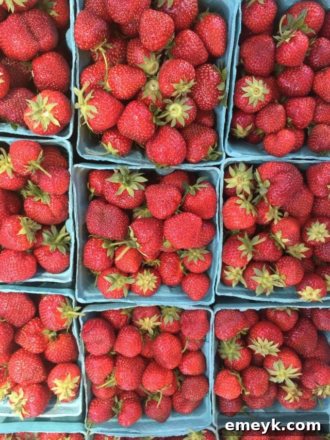 Simmered Salsa Verde Chicken Tacos 5 Pints of ripe, juicy strawberries displayed at a farmers market