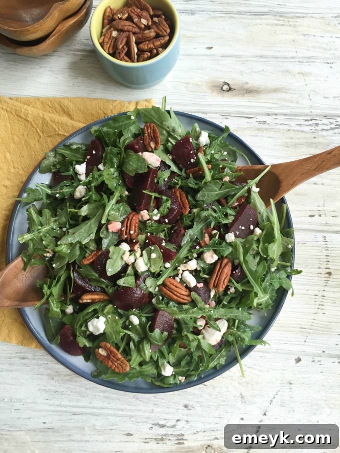 Vibrant Roasted Beet Salad with Crumbled Goat Cheese and Toasted Pecans
