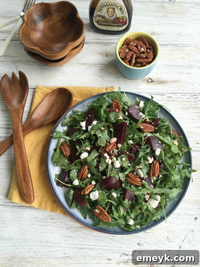 Fresh Ingredients for Roasted Beet Salad: Arugula, Goat Cheese, Pecans, and Beets