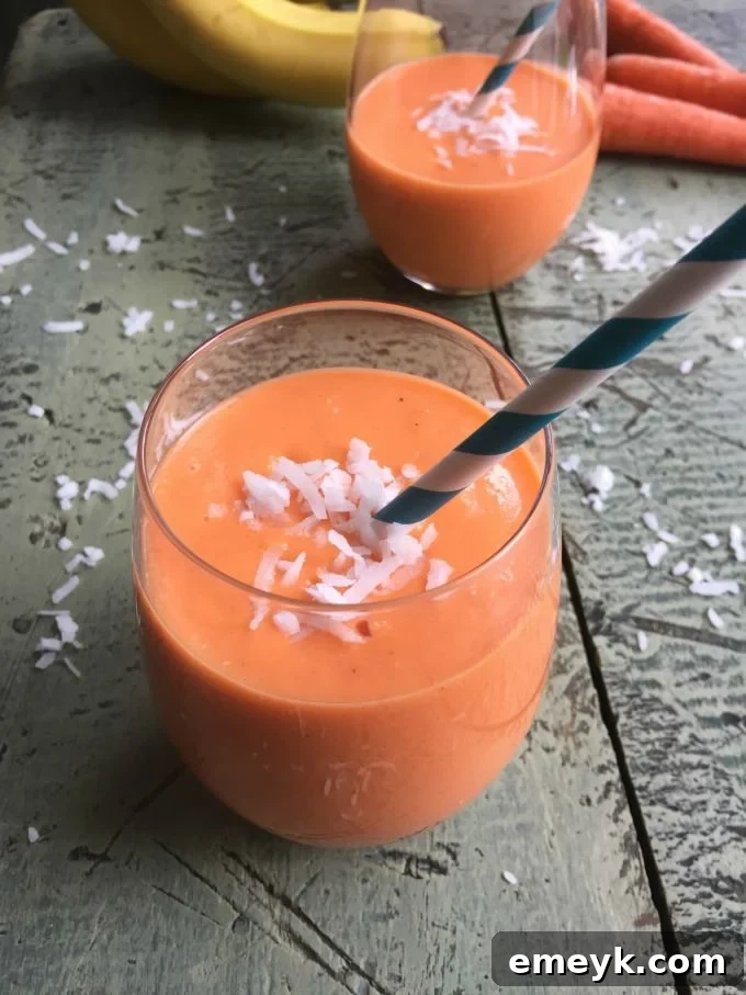 Golden Glow Smoothie 2 Delicious and healthy Coconut Carrot Smoothie served in a glass