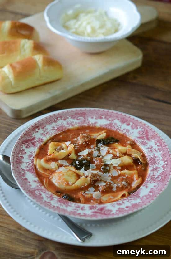 Hearty Sausage Tortellini Soup brimming with fresh kale.