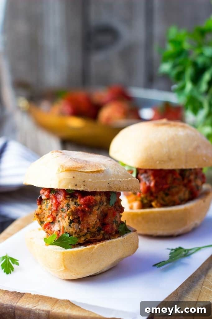 Flavorful Vegetarian Meatball Sliders with white beans, kale, and feta.