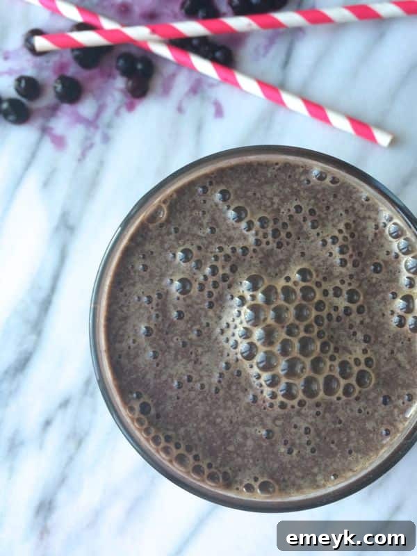 Refreshing Blueberry Kale Power Smoothie in a glass.