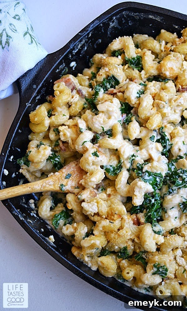Indulgent Mac and Cheese with crispy bacon and healthy kale.
