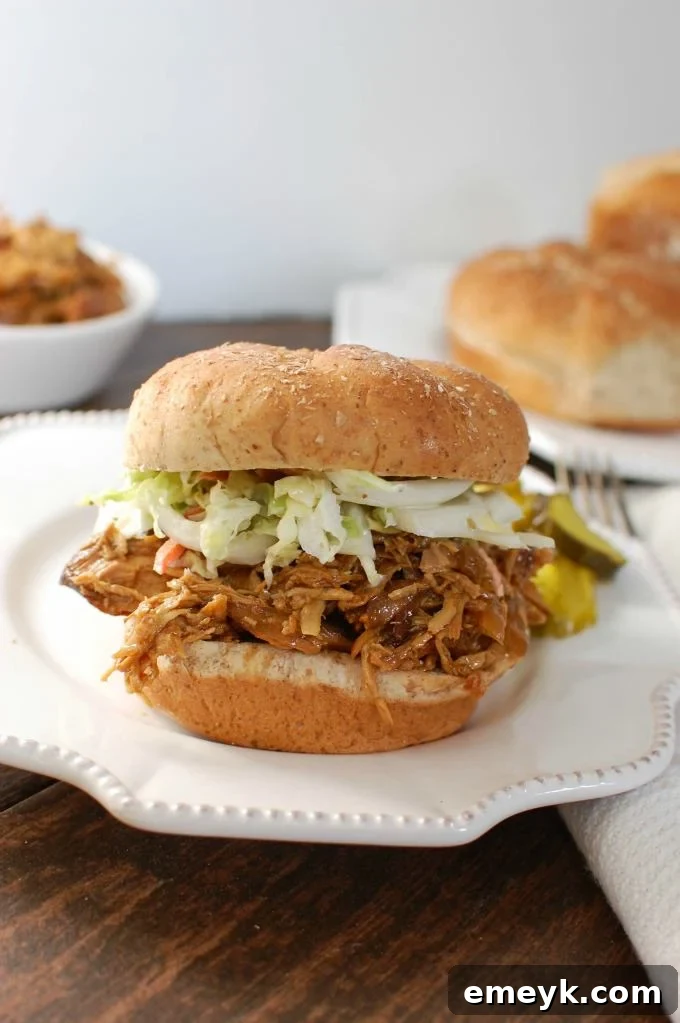 Slow Cooker BBQ Pulled Chicken Sandwich - a delicious and easy weeknight meal solution