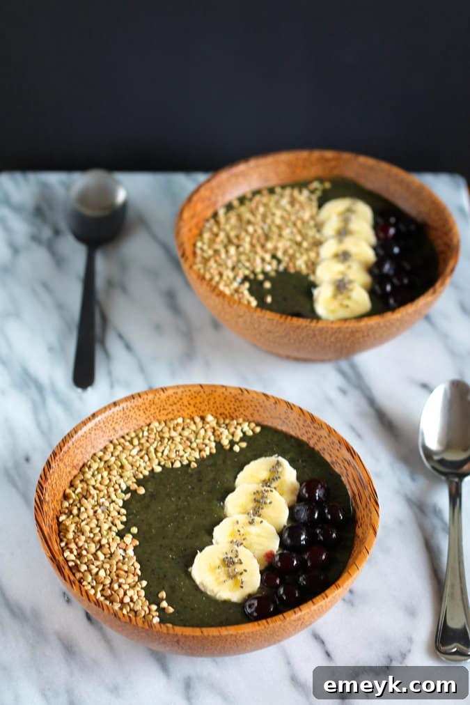 Blueberry Buckwheat Smoothie Bowl topped with fresh fruit and granola