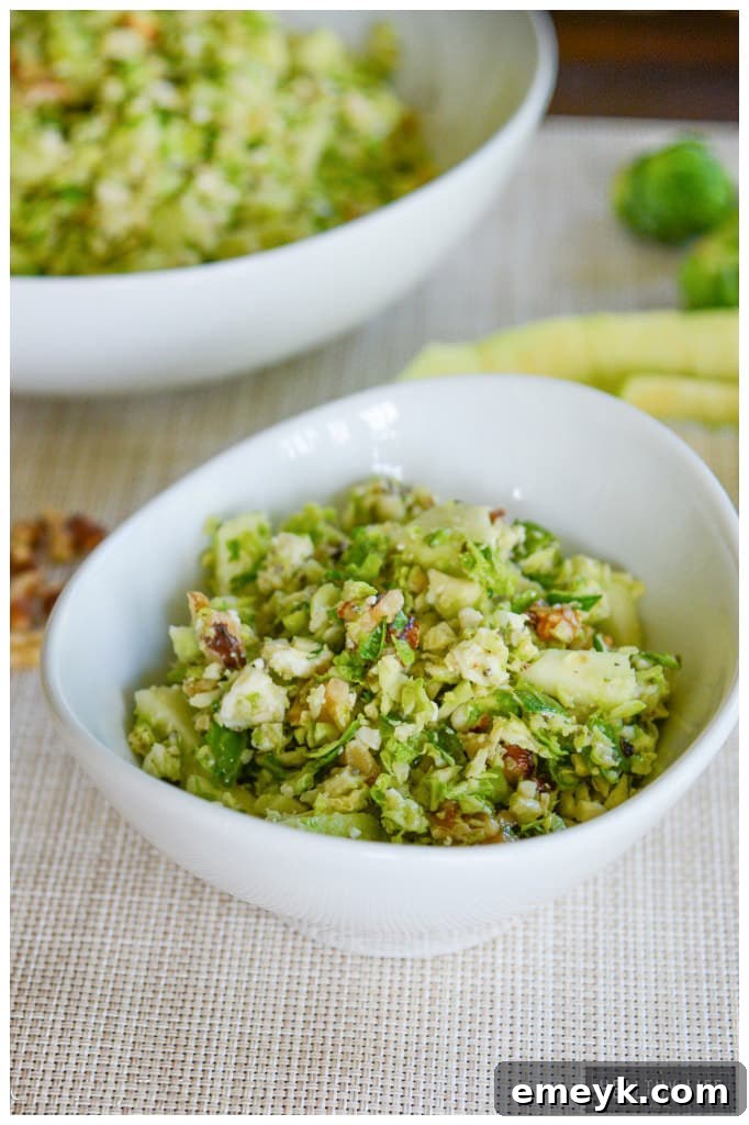 Refreshing Brussels Sprouts and Apple Salad with blue cheese crumbles