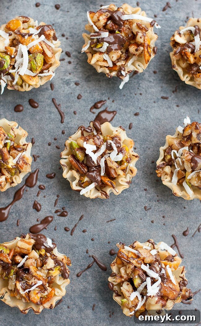Irresistible Thanksgiving Treats 3 Golden-brown baklava bites drizzled with chocolate and sprinkled with coconut and pistachios, perfect no-bake dessert.