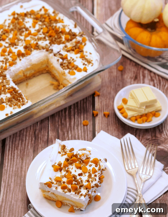 Irresistible Thanksgiving Treats 6 Layers of spiced pumpkin, creamy filling, and whipped topping in a glass dish, resembling a dessert lasagna.