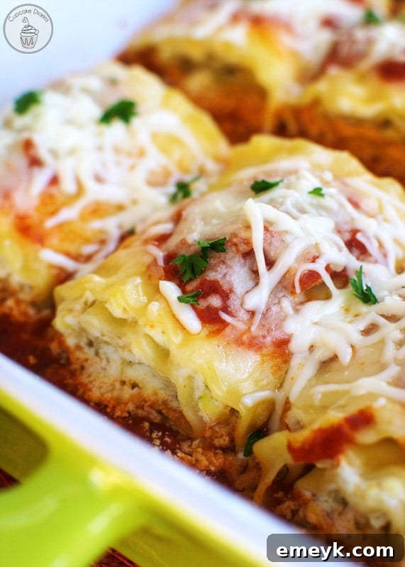Individual Spinach Lasagna Rolls with melted cheese