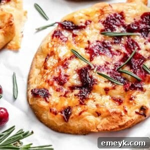 Warm Brie Cranberry Naan Bread, a close-up of the baked appetizer